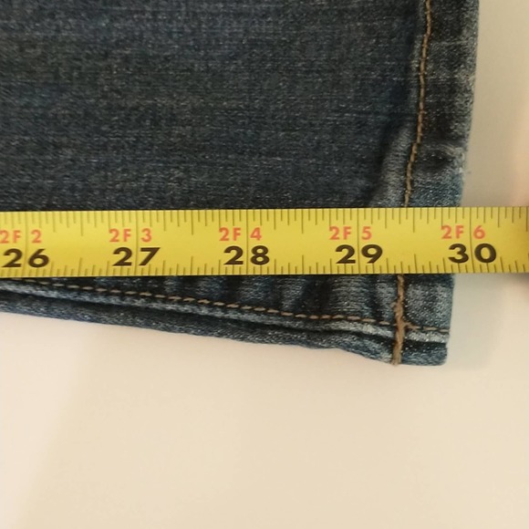 Calvin Klein medium wash mid-rise bootcut women's jeans. 12. - Picture 12 of 12